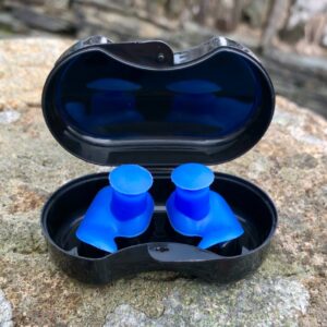 Blue earplugs for swimming in case
